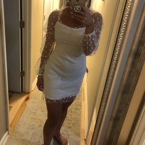 White sleeved dress with polka dots